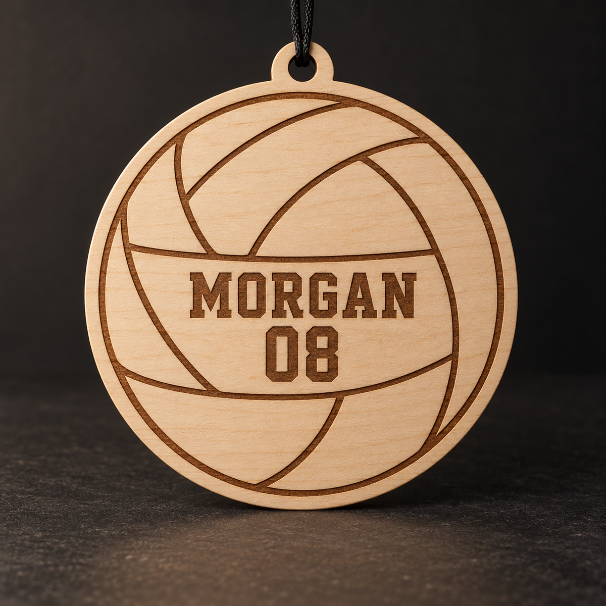 Game Day Volleyball Ornament in Birch Ply with brown laser engraved details; illustrative rendering
